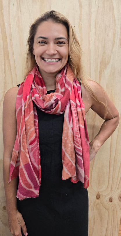 An Aboriginal woman wearing a Aboriginal artwork scarf in cashmere wool